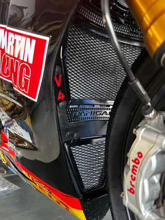Craig McMartin Panigale v4r race bike fitted with black Rad Guards