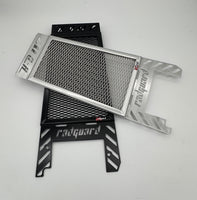 Motorcycle radiator guard with 'Radiator' branding on a white background, in black and polished alloy for Harley Davidson Heritage Classic 117 