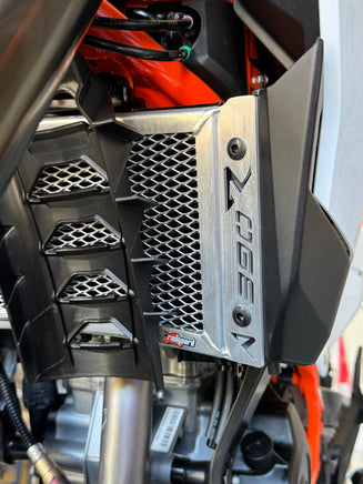 Side view of the quality and custom fit for the KTM 390 Enduro R fitting to the mounting points on the bike. Protecting from rock and road debris. 
