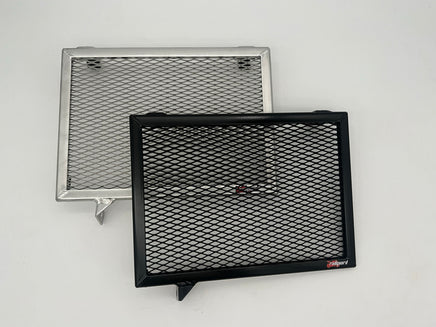 Two Rad Guards, one black and one polished alloy, on a white background